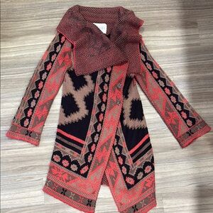 Geometric Patterned Sweater with Red Accents